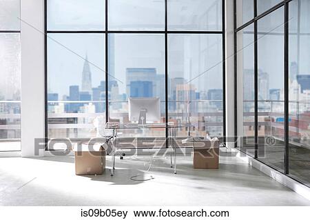 Boxes in empty office View Large Photo Image Stock Photo - Boxes in empty office. Fotosearch