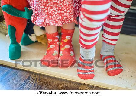 Brother and sister standing together, wearing night clothes, low section View Large Photo Image Stock Image - Brother and sister standing together, wearing night clothes, low section. Fotosearch