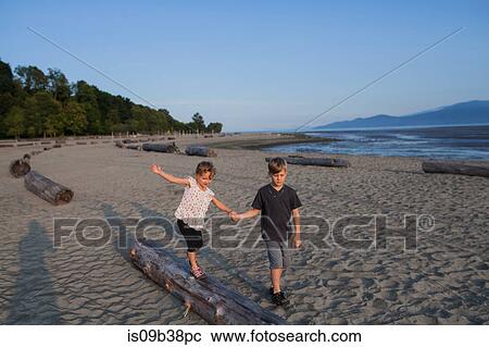 Children playing on beach, Vancouver, British Columbia, Canada View Large Photo Image Stock Image - Children playing on beach, Vancouver, British Columbia, Canada. Fotosearch
