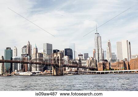 Cityscape view of Brooklyn Bridge over East river, New York, USA View Large Photo Image Stock Photo - Cityscape view of Brooklyn Bridge over East river, New York, USA. Fotosearch