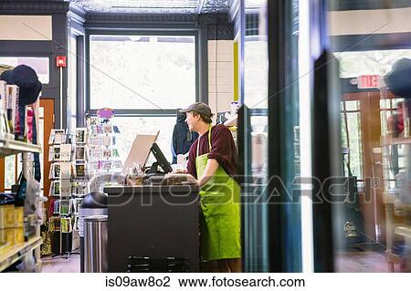 Clerk in general store, Hague, USA View Large Photo Image Stock Image - Clerk in general store, Hague, USA. Fotosearch