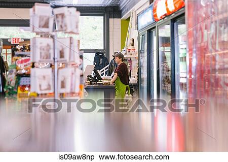 Clerk in general store, Hague, USA View Large Photo Image Stock Photography - Clerk in general store, Hague, USA. Fotosearch