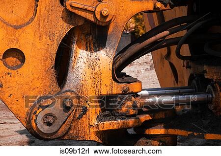 Close up of grease-covered hydraulics on excavator View Large Photo Image Stock Image - Close up of grease-covered hydraulics on excavator. Fotosearch