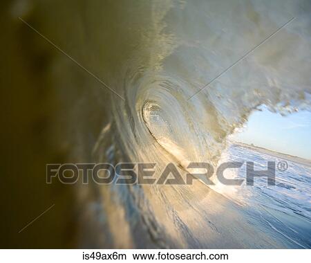 Close up surface level view of rolling wave and beach, Laguna Beach, California, USA View Large Photo Image Picture - Close up surface level view of rolling wave and beach, Laguna Beach, California, USA. Fotosearch