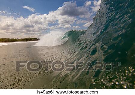 Close up surface level view of rolling wave and beach, Laguna Beach, California, USA View Large Photo Image Stock Image - Close up surface level view of rolling wave and beach, Laguna Beach, California, USA. Fotosearch