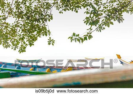 Stock Image - Colourful fishing boats be sea, Florianopolis, Santa Catarina, Brazil. Fotosearch