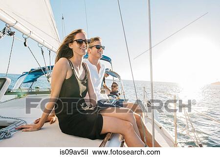 Couple enjoying view on sailboat, San Diego Bay, California, USA View Large Photo Image Stock Image - Couple enjoying view on sailboat, San Diego Bay, California, USA. Fotosearch