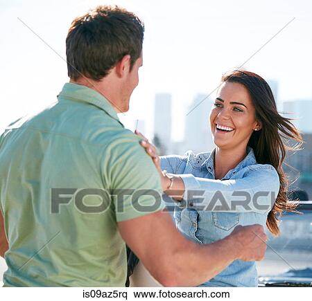 Couple hugging and smiling View Large Photo Image Stock Photography - Couple hugging and smiling. Fotosearch