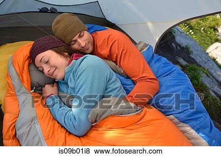 Couple hugging in sleeping bags in tent at Fault Lake, Selkirk Mountains, Idaho View Large Photo Image Stock Photo - Couple hugging in sleeping bags in tent at Fault Lake, Selkirk Mountains, Idaho. Fotosearch