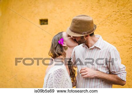 Couple kissing in street, Mexico City, Mexico View Large Photo Image Stock Photo - Couple kissing in street, Mexico City, Mexico. Fotosearch