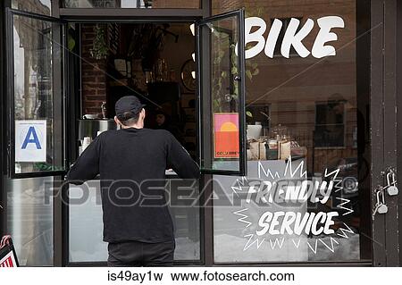 Customer at service window, Nike and Coffee shop, New York, USA View Large Photo Image Stock Photo - Customer at service window, Nike and Coffee shop, New York, USA. Fotosearch