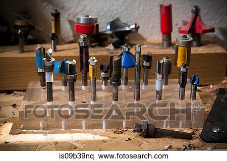Drill bits in plastic block in workshop View Large Photo Image Stock Photography - Drill bits in plastic block in workshop. Fotosearch