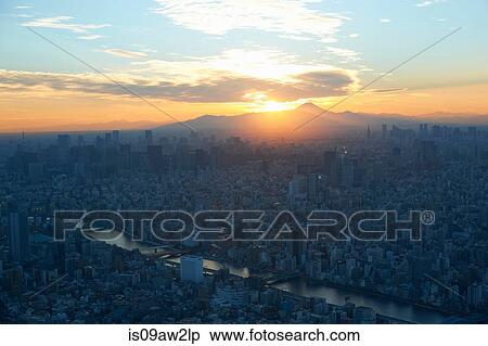 Elevated cityscape view with sunset over Mount Fuji, Tokyo, Japan View Large Photo Image Stock Photography - Elevated cityscape view with sunset over Mount Fuji, Tokyo, Japan. Fotosearch