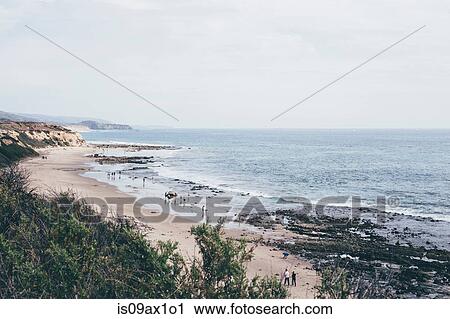 Elevated distant view of people on beach, Crystal Cove State Park, Laguna Beach, California, USA View Large Photo Image Stock Image - Elevated distant view of people on beach, Crystal Cove State Park, Laguna Beach, California, USA. Fotosearch