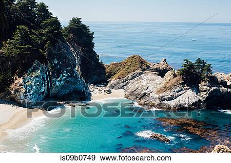 Elevated view of McWay Falls on coast, Julia Pfeiffer Burns State Park, Big Sur, California, USA View Large Photo Image Stock Photo - Elevated view of McWay Falls on coast, Julia Pfeiffer Burns State Park, Big Sur, California, USA. Fotosearch