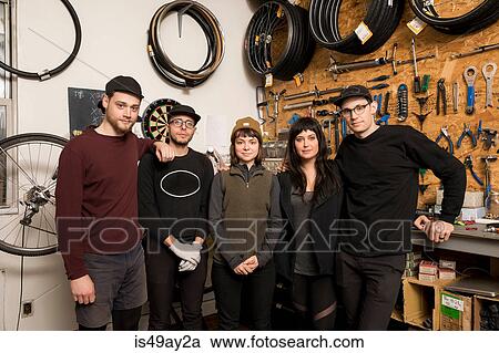 Employees in bicycle workshop View Large Photo Image Stock Image - Employees in bicycle workshop. Fotosearch