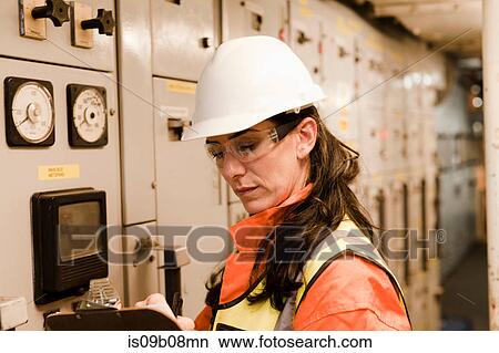 Engineer working on oil rig View Large Photo Image Picture - Engineer working on oil rig. Fotosearch