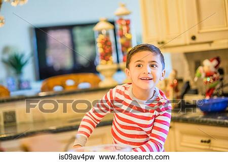 Excited boy in kitchen View Large Photo Image Stock Photo - Excited boy in kitchen. Fotosearch