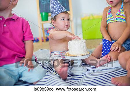Family at birthday celebration View Large Photo Image Picture - Family at birthday celebration. Fotosearch