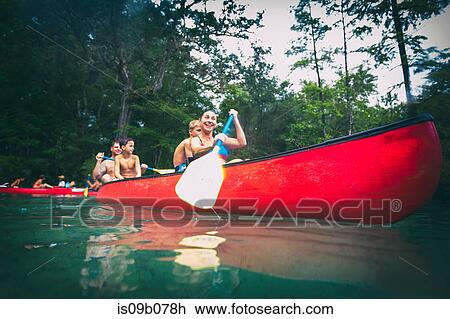 Family on a canoe trip together at Econfina Spring, Florida, USA View Large Photo Image Stock Image - Family on a canoe trip together at Econfina Spring, Florida, USA. Fotosearch