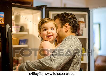 Father and daughter in kitchen View Large Photo Image Stock Photography - Father and daughter in kitchen. Fotosearch