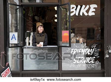 Female employee at service window, Nike and Coffee shop, New York, USA View Large Photo Image Stock Photo - Female employee at service window, Nike and Coffee shop, New York, USA. Fotosearch