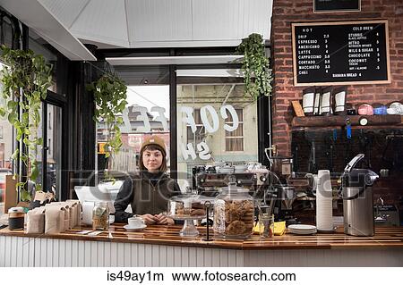 Female employee in cafe, New York, USA View Large Photo Image Picture - Female employee in cafe, New York, USA. Fotosearch