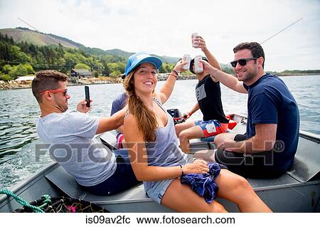 Five adult friends raising a beer can on fishing boat at Nehalem Bay, Oregon, USA View Large Photo Image Stock Image - Five adult friends raising a beer can on fishing boat at Nehalem Bay, Oregon, USA. Fotosearch