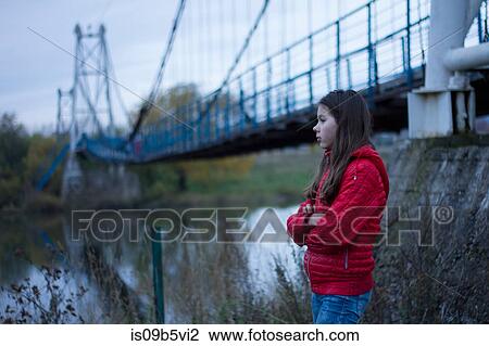 Girl by pedestrian bridge, Chusovoy, Russia View Large Photo Image Stock Image - Girl by pedestrian bridge, Chusovoy, Russia. Fotosearch