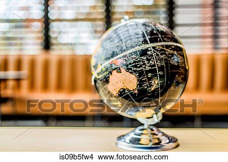 Globe on table View Large Photo Image Picture - Globe on table. Fotosearch