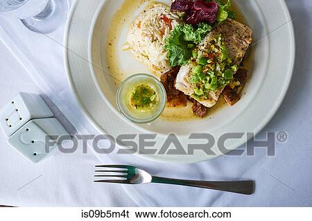 Grilled Mahi Mahi, with fresh vegetables and rice, overhead view View Large Photo Image Stock Photograph - Grilled Mahi Mahi, with fresh vegetables and rice, overhead view. Fotosearch