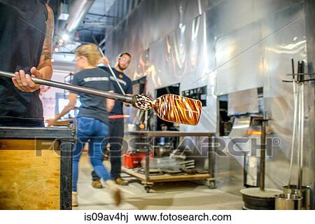 Group of young adults blowing glass View Large Photo Image Stock Image - Group of young adults blowing glass. Fotosearch