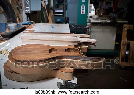 Guitar body in workshop View Large Photo Image Stock Image - Guitar body in workshop. Fotosearch