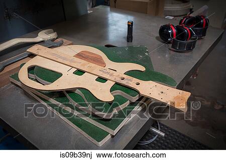 Guitar parts in workshop View Large Photo Image Stock Image - Guitar parts in workshop. Fotosearch