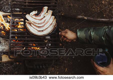 Hands of male hiker frying bacon on campfire, Mineral King, Sequoia National Park, California, USA View Large Photo Image Stock Image - Hands of male hiker frying bacon on campfire, Mineral King, Sequoia National Park, California, USA. Fotosearch