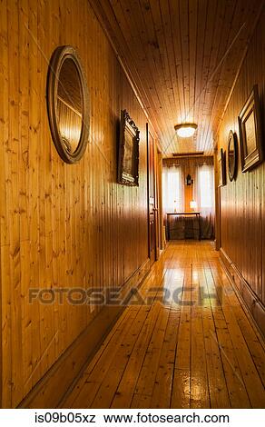 Hardwood floor upstairs hallway in 1920s cottage style old home, Quebec, Canada View Large Photo Image Stock Photo - Hardwood floor upstairs hallway in 1920s cottage style old home, Quebec, Canada. Fotosearch