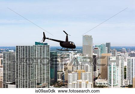 Helicopter and skyscrapers, Brickell, Downtown Miami, Florida, USA View Large Photo Image Stock Image - Helicopter and skyscrapers, Brickell, Downtown Miami, Florida, USA. Fotosearch