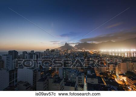 Stock Image - High angle cityscape at sunset, South Zone, Rio de Janeiro, Brazil. Fotosearch