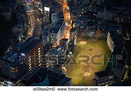 High angle view of floodlit city playing field at night, Tokyo, Japan View Large Photo Image Stock Image - High angle view of floodlit city playing field at night, Tokyo, Japan. Fotosearch