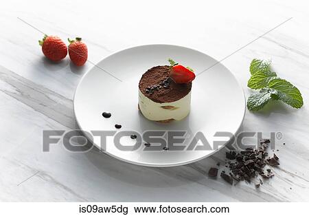 High angle view of tiramisu on plate with fresh strawberries View Large Photo Image Stock Image - High angle view of tiramisu on plate with fresh strawberries. Fotosearch