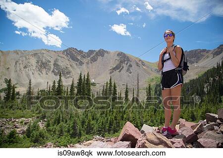 Hiker enjoying view on rocks, Aspen, Colorado View Large Photo Image Stock Image - Hiker enjoying view on rocks, Aspen, Colorado. Fotosearch