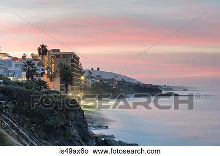 Landscape view of cliffs and beach at dawn, Laguna Beach, California, USA View Large Photo Image Picture - Landscape view of cliffs and beach at dawn, Laguna Beach, California, USA. Fotosearch