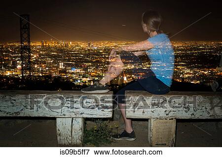 Long exposure of jogger on bench looking away at view, Runyon Canyon, Los Angeles, California, USA View Large Photo Image Stock Photo - Long exposure of jogger on bench looking away at view, Runyon Canyon, Los Angeles, California, USA. Fotosearch