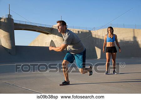 Male athlete exercising, Van Nuys, California, USA View Large Photo Image Stock Photography - Male athlete exercising, Van Nuys, California, USA. Fotosearch