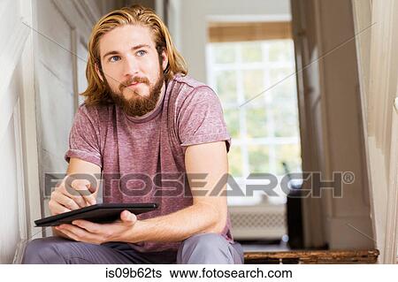 Male designer contemplating on creative studio step View Large Photo Image Stock Photograph - Male designer contemplating on creative studio step. Fotosearch