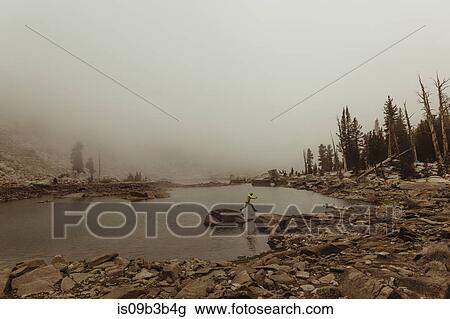 Male hiker leaping from lake rock, Mineral King, Sequoia National Park, California, USA View Large Photo Image Stock Image - Male hiker leaping from lake rock, Mineral King, Sequoia National Park, California, USA. Fotosearch
