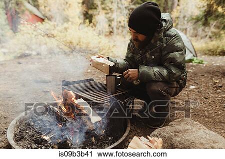 Male hiker preparing coffee on campfire, Mineral King, Sequoia National Park, California, USA View Large Photo Image Stock Image - Male hiker preparing coffee on campfire, Mineral King, Sequoia National Park, California, USA. Fotosearch