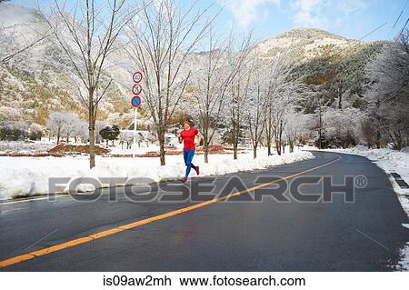 Male runner running on road in winter, Lake Kawaguchiko, Mount Fuji, Japan View Large Photo Image Stock Image - Male runner running on road in winter, Lake Kawaguchiko, Mount Fuji, Japan. Fotosearch
