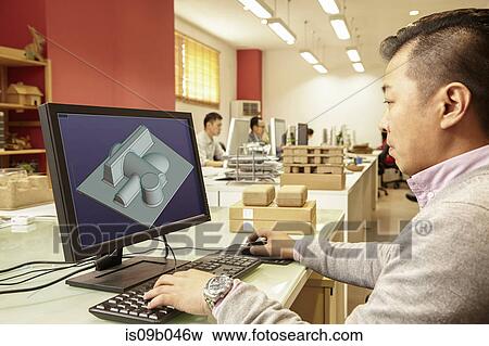 Male technician working on computer in printing and packaging factory, China View Large Photo Image Stock Photo - Male technician working on computer in printing and packaging factory, China. Fotosearch