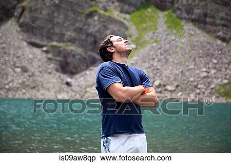 Man breathing in fresh air, Cathedral Lake, Aspen, Colorado View Large Photo Image Stock Photography - Man breathing in fresh air, Cathedral Lake, Aspen, Colorado. Fotosearch